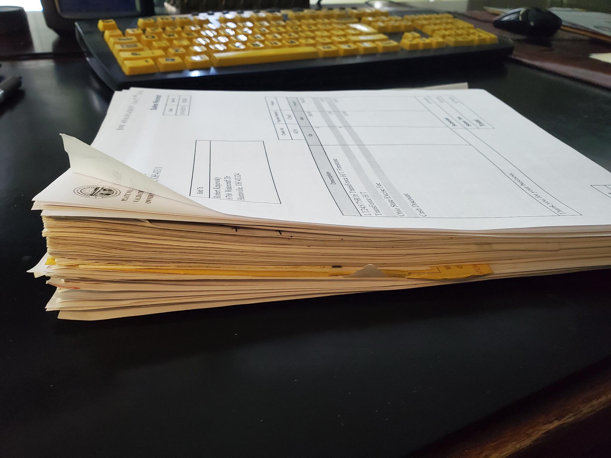 Previous owners records of maintainence. Mine is one one page. When I did the DOT and service earch year.