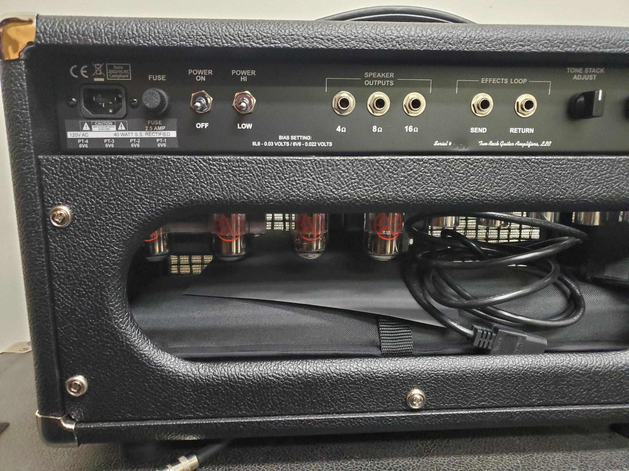 The Vintage Deluxe is a single-channel amp that features lush all-tube analog reverb and a smooth bias tremolo circuit. The Vintage Deluxe utilizes a new texture switch that changes the feel of the amp from a soft scooped front-end to a faster note attack with an increased amount of harmonic content. Another unique feature is the Tone Stack select switch. When engaged via the foot switch or toggle, the tone stack on the front on the amplifier is bypassed and a secondary tone stack with a single Tone control on the back on the amplifier becomes active. This allows you to shape your tone from dark and wooly to a nicely overdriven, organic lead tone.  The Vintage Deluxe gives you that nostalgic feeling from the golden era of tube amplifiers built in the early to mid-sixties, along with all of the performance, trusted reliability, and unique voice that you expect from a Two-Rock.  Head Features:  Single channel, 4 X 6V6, 40 Watts, Switchable to 20 Watts Texture Switch Tone Stack Select Switch bypasses Bass/Middle/Treble controls and engages rear panel single Tone control Tube driven analog Spring Reverb with Send and Return controls Bias Tremolo All steel chassis for vintage vibe, feel and tone, Foot switchable Tone Stack Select and Bias Tremolo 4, 8, 16 ohm output Dimensions: 20 5/8" W x 12" H x 10 5/8 D / Weight: 47 lbs  Tube Compliment V1- Preamp 12AX7 V2- Reverb Drive 12AT7 V3- Reverb Mix 12AX7 V4- Reverb Send, Reverb Stage 1 12AX7  V5- Tremolo Oscillator 12AX7  V6- Phase Splitter 12AX7 V7-V8 – 6V6 Output
